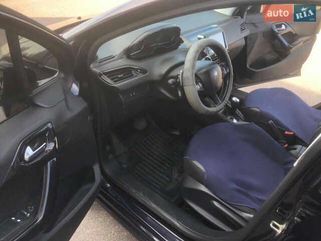 Синій Пежо 208, об'ємом двигуна 1.4 л та пробігом 230 тис. км за 6999 $, фото 15 на Automoto.ua