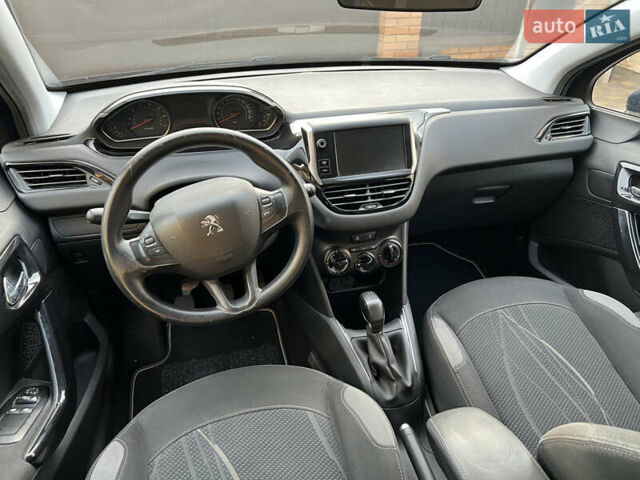 Синий Пежо 208, объемом двигателя 1.2 л и пробегом 200 тыс. км за 5200 $, фото 15 на Automoto.ua