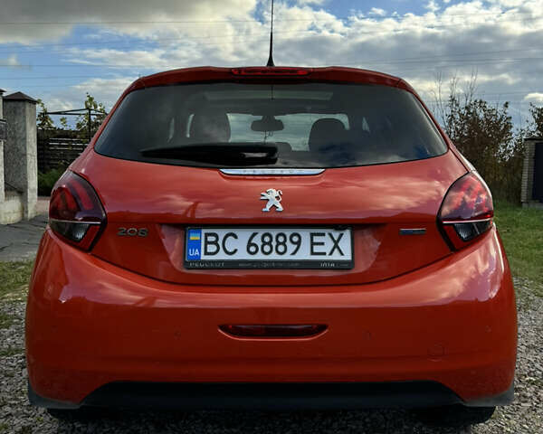 Помаранчевий Пежо 208, об'ємом двигуна 1.2 л та пробігом 125 тис. км за 8300 $, фото 4 на Automoto.ua