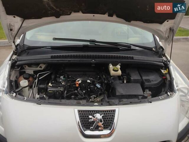 Белый Пежо 3008, объемом двигателя 2 л и пробегом 224 тыс. км за 10300 $, фото 39 на Automoto.ua