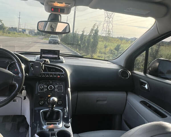 Черный Пежо 3008, объемом двигателя 2 л и пробегом 270 тыс. км за 8200 $, фото 4 на Automoto.ua