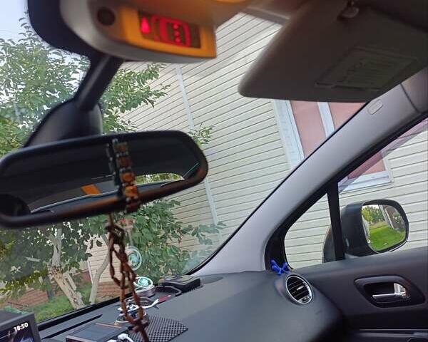 Черный Пежо 3008, объемом двигателя 2 л и пробегом 260 тыс. км за 10900 $, фото 17 на Automoto.ua