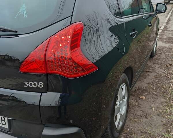 Черный Пежо 3008, объемом двигателя 2 л и пробегом 255 тыс. км за 9999 $, фото 4 на Automoto.ua
