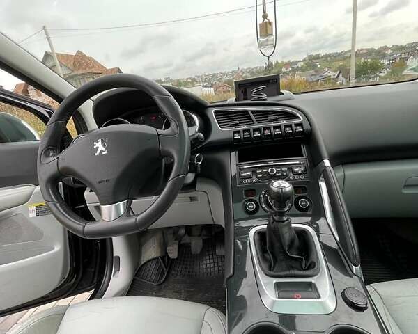 Черный Пежо 3008, объемом двигателя 2 л и пробегом 281 тыс. км за 8200 $, фото 16 на Automoto.ua