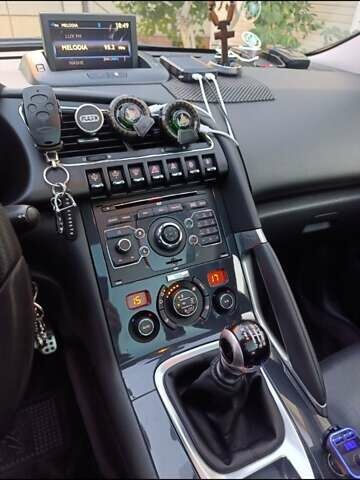 Черный Пежо 3008, объемом двигателя 2 л и пробегом 260 тыс. км за 10900 $, фото 18 на Automoto.ua