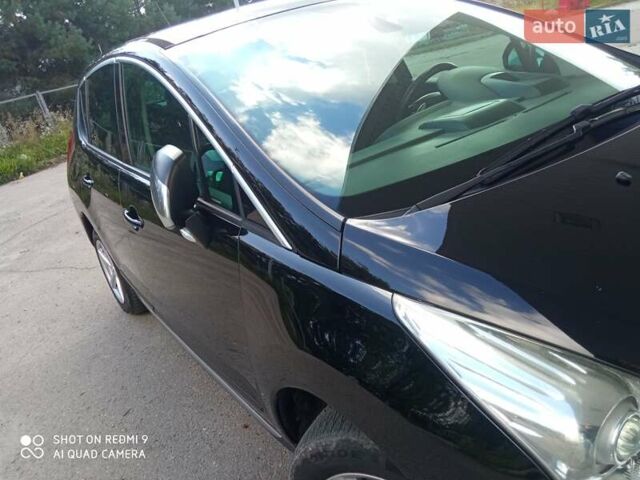 Черный Пежо 3008, объемом двигателя 1.6 л и пробегом 260 тыс. км за 8100 $, фото 13 на Automoto.ua