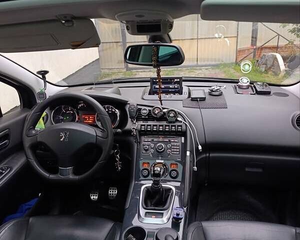 Черный Пежо 3008, объемом двигателя 2 л и пробегом 260 тыс. км за 10900 $, фото 12 на Automoto.ua