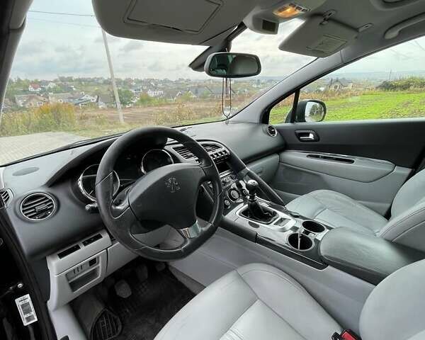 Черный Пежо 3008, объемом двигателя 2 л и пробегом 281 тыс. км за 8200 $, фото 10 на Automoto.ua