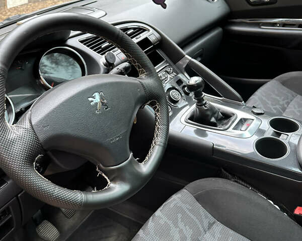 Пежо 3008 2010 в Львове на Automoto.ua Черный Пежо 3008, объемом двигателя 1.6 л и пробегом 206 тыс. км за 7700 $, фото 9 на Automoto.ua