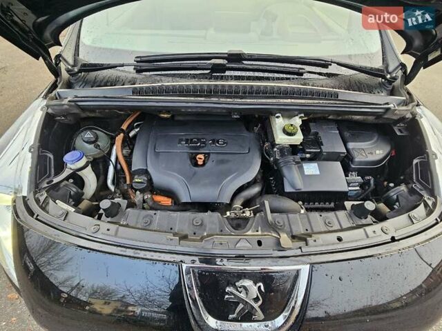 Черный Пежо 3008, объемом двигателя 2 л и пробегом 175 тыс. км за 10700 $, фото 9 на Automoto.ua
