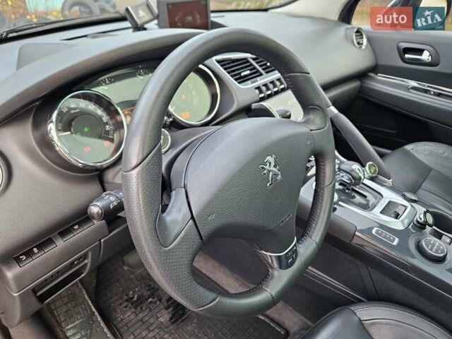 Черный Пежо 3008, объемом двигателя 2 л и пробегом 175 тыс. км за 10700 $, фото 12 на Automoto.ua