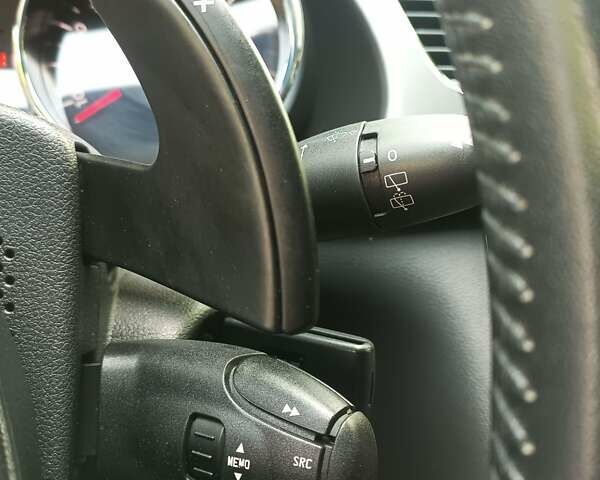 Черный Пежо 3008, объемом двигателя 1.6 л и пробегом 190 тыс. км за 10400 $, фото 17 на Automoto.ua