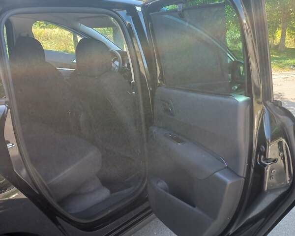 Черный Пежо 3008, объемом двигателя 1.56 л и пробегом 242 тыс. км за 10300 $, фото 10 на Automoto.ua