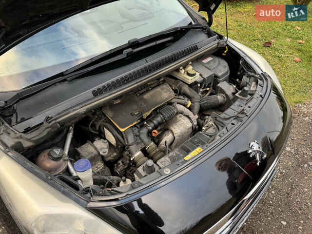 Черный Пежо 3008, объемом двигателя 1.56 л и пробегом 256 тыс. км за 12000 $, фото 76 на Automoto.ua