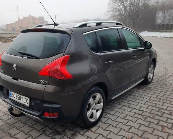 Коричневый Пежо 3008, объемом двигателя 1.6 л и пробегом 294 тыс. км за 8100 $, фото 3 на Automoto.ua