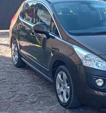 Коричневый Пежо 3008, объемом двигателя 1.6 л и пробегом 230 тыс. км за 8700 $, фото 9 на Automoto.ua