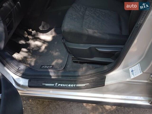 Серый Пежо 3008, объемом двигателя 1.6 л и пробегом 174 тыс. км за 6800 $, фото 5 на Automoto.ua