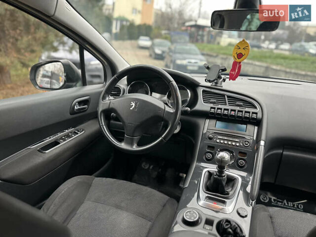 Серый Пежо 3008, объемом двигателя 1.56 л и пробегом 237 тыс. км за 7400 $, фото 11 на Automoto.ua
