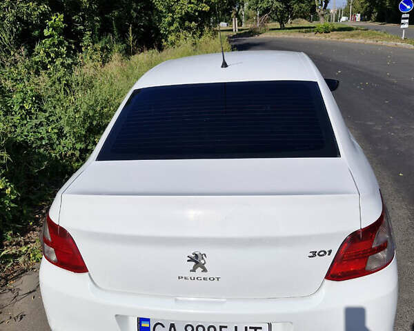 Білий Пежо 301, об'ємом двигуна 1.2 л та пробігом 239 тис. км за 4199 $, фото 4 на Automoto.ua