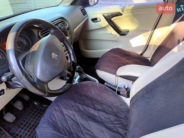 Білий Пежо 301, об'ємом двигуна 1.6 л та пробігом 145 тис. км за 6200 $, фото 3 на Automoto.ua