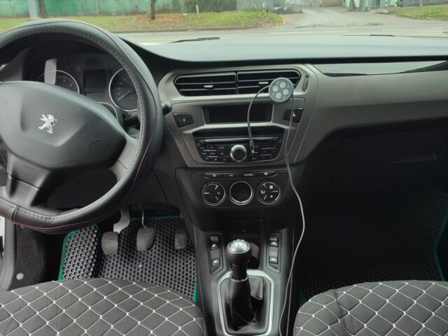 Білий Пежо 301, об'ємом двигуна 1.2 л та пробігом 120 тис. км за 7900 $, фото 5 на Automoto.ua