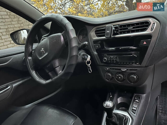 Чорний Пежо 301, об'ємом двигуна 1.2 л та пробігом 120 тис. км за 6400 $, фото 11 на Automoto.ua