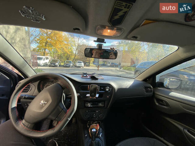 Пежо 301 2013 в Тернополе на Automoto.ua Черный Пежо 301, объемом двигателя 1.2 л и пробегом 233 тыс. км за 5699 $, фото 6 на Automoto.ua