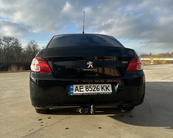 Чорний Пежо 301, об'ємом двигуна 1.2 л та пробігом 120 тис. км за 6400 $, фото 7 на Automoto.ua