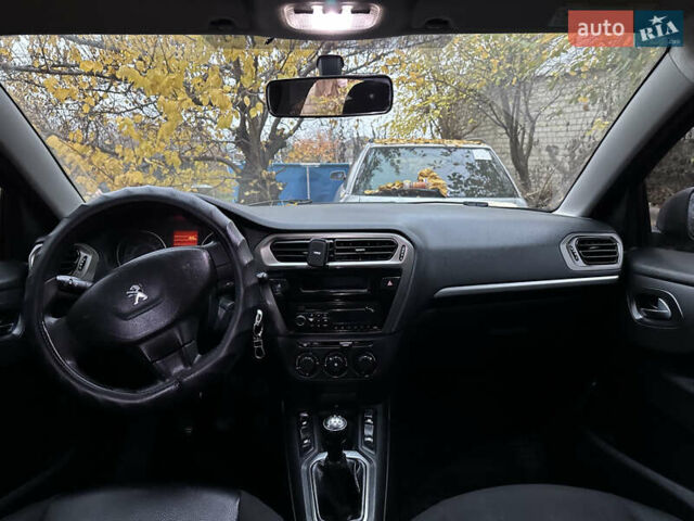 Чорний Пежо 301, об'ємом двигуна 1.2 л та пробігом 120 тис. км за 6400 $, фото 9 на Automoto.ua