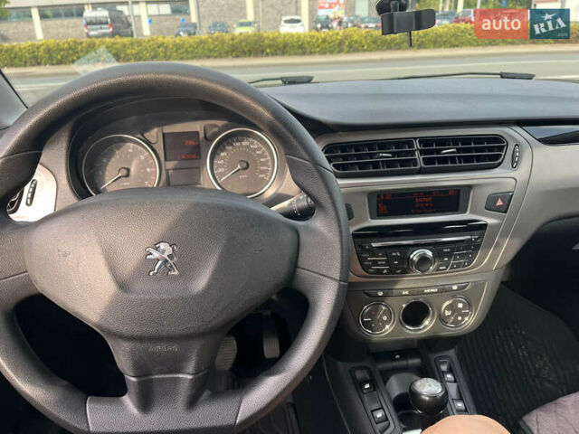 Черный Пежо 301, объемом двигателя 1.59 л и пробегом 125 тыс. км за 8700 $, фото 1 на Automoto.ua