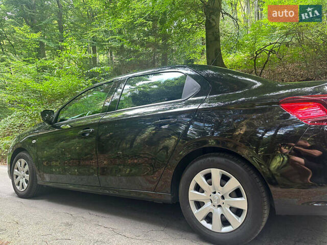 Черный Пежо 301, объемом двигателя 1.59 л и пробегом 125 тыс. км за 8700 $, фото 6 на Automoto.ua