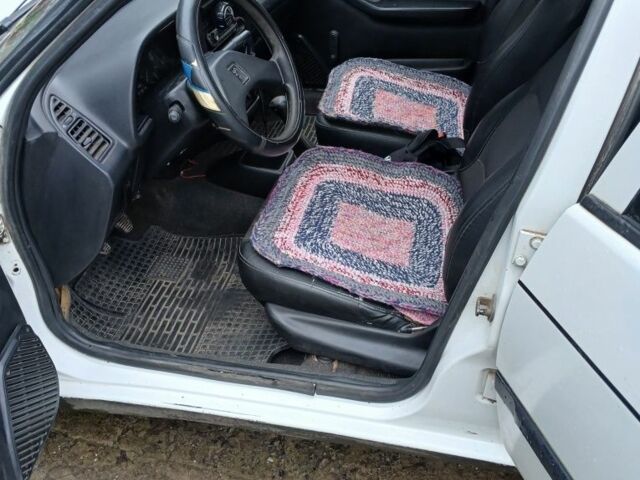 Белый Пежо 306, объемом двигателя 1.4 л и пробегом 364 тыс. км за 1300 $, фото 5 на Automoto.ua