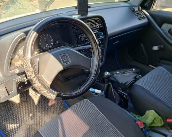 Белый Пежо 306, объемом двигателя 1.4 л и пробегом 300 тыс. км за 800 $, фото 1 на Automoto.ua