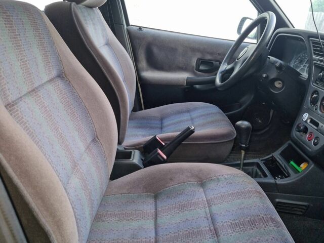 Сірий Пежо 306, об'ємом двигуна 1.4 л та пробігом 300 тис. км за 1500 $, фото 3 на Automoto.ua