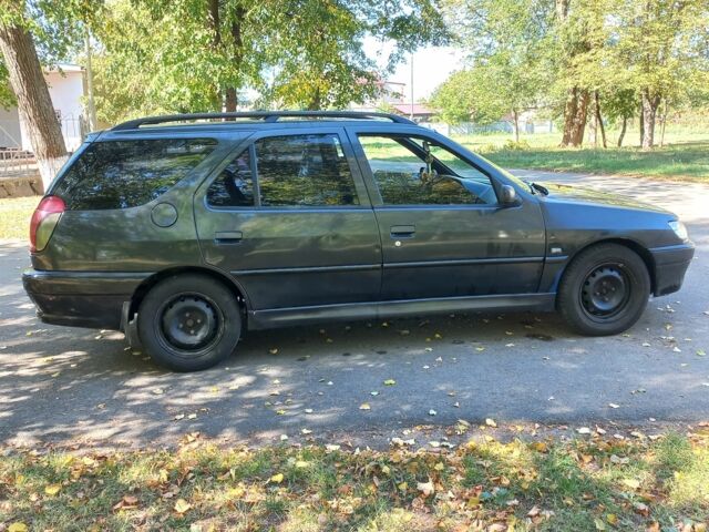 Синий Пежо 306, объемом двигателя 2 л и пробегом 496 тыс. км за 2400 $, фото 2 на Automoto.ua