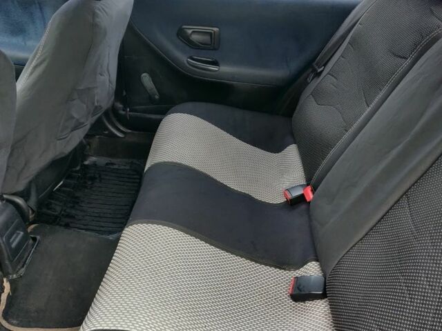 Зеленый Пежо 306, объемом двигателя 1.4 л и пробегом 457 тыс. км за 1700 $, фото 3 на Automoto.ua