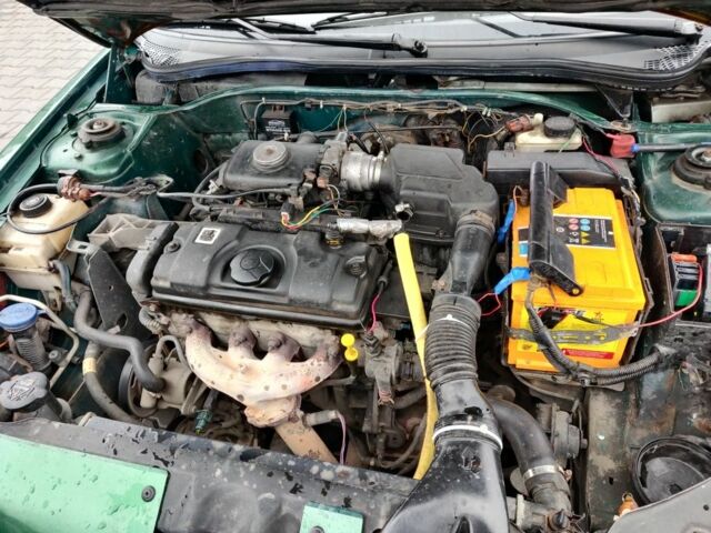 Зеленый Пежо 306, объемом двигателя 1.4 л и пробегом 457 тыс. км за 1700 $, фото 1 на Automoto.ua