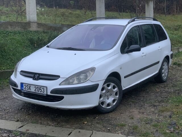 Белый Пежо 307, объемом двигателя 1.6 л и пробегом 566 тыс. км за 1550 $, фото 1 на Automoto.ua