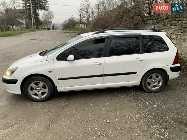 Білий Пежо 307, об'ємом двигуна 1.4 л та пробігом 406 тис. км за 3499 $, фото 4 на Automoto.ua