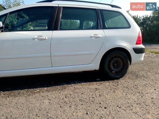 Білий Пежо 307, об'ємом двигуна 1.4 л та пробігом 273 тис. км за 4200 $, фото 4 на Automoto.ua