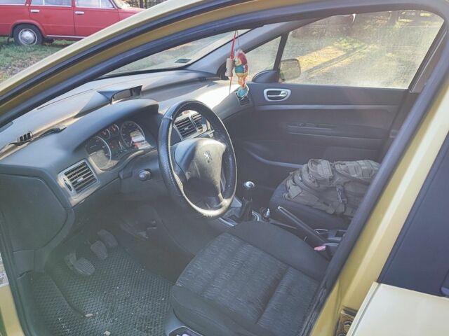 Бежевый Пежо 307, объемом двигателя 2 л и пробегом 370 тыс. км за 1600 $, фото 7 на Automoto.ua