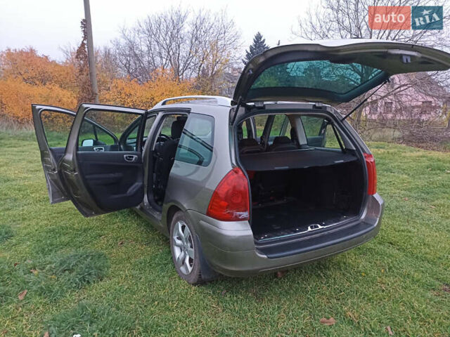 Бежевый Пежо 307, объемом двигателя 2 л и пробегом 86 тыс. км за 4850 $, фото 3 на Automoto.ua