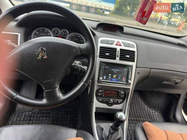 Черный Пежо 307, объемом двигателя 1.59 л и пробегом 280 тыс. км за 4100 $, фото 6 на Automoto.ua