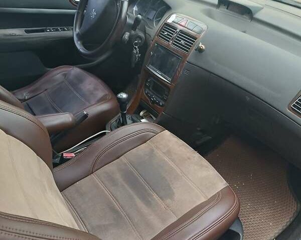 Черный Пежо 307, объемом двигателя 1.99 л и пробегом 320 тыс. км за 2300 $, фото 3 на Automoto.ua
