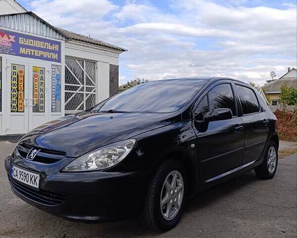 Черный Пежо 307, объемом двигателя 1.59 л и пробегом 380 тыс. км за 4500 $, фото 1 на Automoto.ua