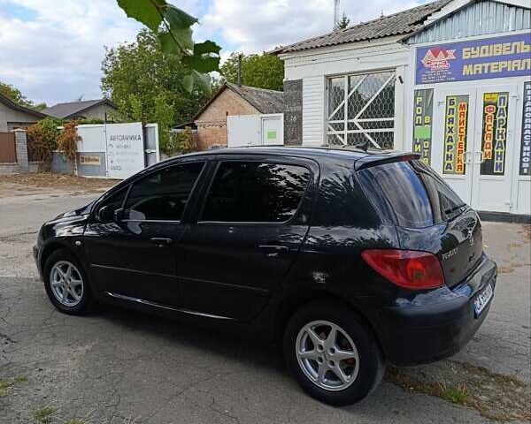 Черный Пежо 307, объемом двигателя 1.59 л и пробегом 380 тыс. км за 4500 $, фото 9 на Automoto.ua