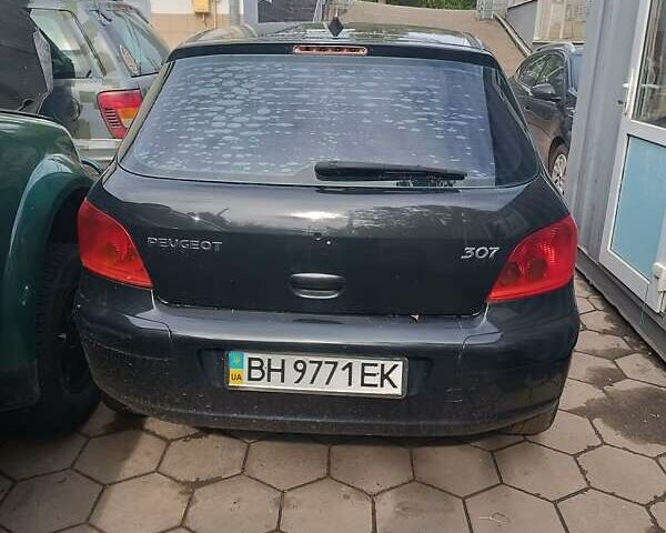 Черный Пежо 307, объемом двигателя 1.99 л и пробегом 320 тыс. км за 2300 $, фото 4 на Automoto.ua