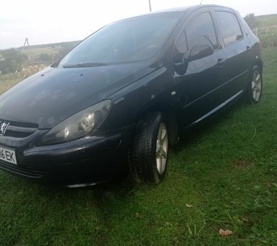 Черный Пежо 307, объемом двигателя 2 л и пробегом 150 тыс. км за 3300 $, фото 4 на Automoto.ua