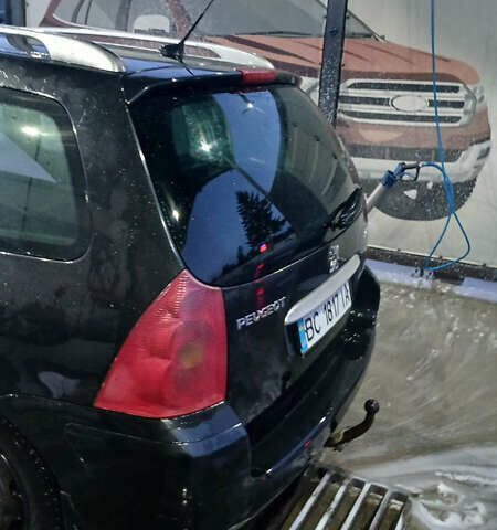 Черный Пежо 307, объемом двигателя 1.6 л и пробегом 293 тыс. км за 4400 $, фото 2 на Automoto.ua