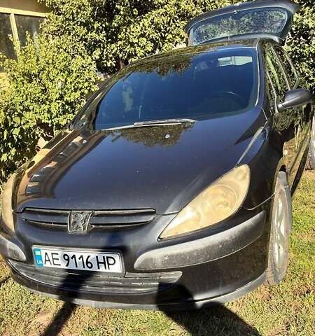 Черный Пежо 307, объемом двигателя 2 л и пробегом 205 тыс. км за 3900 $, фото 7 на Automoto.ua